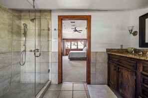 Shower, hair dryer, towels, shampoo
