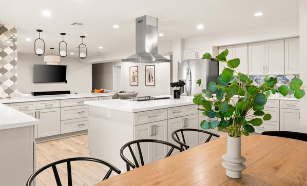 Enjoy meals in our dining area, right next to the kitchen