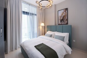 Deluxe Apartment, Balcony, City View | 1 bedroom, premium bedding, down duvets, memory-foam beds - Business Bay Coziest 1BR Nest (Dubai)