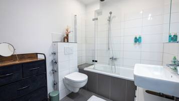 Hair dryer, towels, soap, shampoo