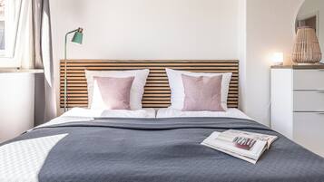 2 bedrooms, desk, iron/ironing board, travel crib