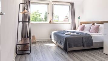 2 bedrooms, desk, iron/ironing board, travel crib