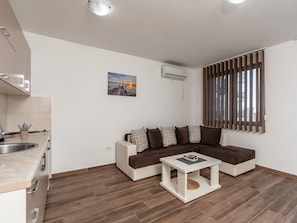 Classic-Apartment | Wohnbereich | Fernseher