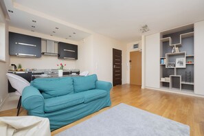 Apartment, 1 Bedroom, Balcony | Living area | 43-inch Smart TV with digital channels