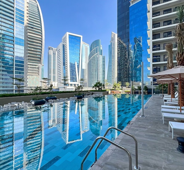 Outdoor pool - Spectacular Views 1BR Apt Business Bay (Dubai)