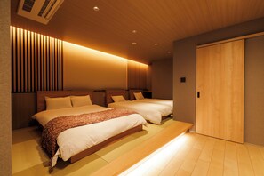 尊貴四人房 | 書桌、免費 Wi-Fi、床單