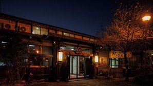 A traditional building with a wooden facade, large windows, and a signboard. - Ryokufuen Kiyoharu (Takayama)