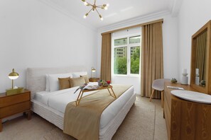Apartment | 1 bedroom, in-room safe, blackout drapes, iron/ironing board