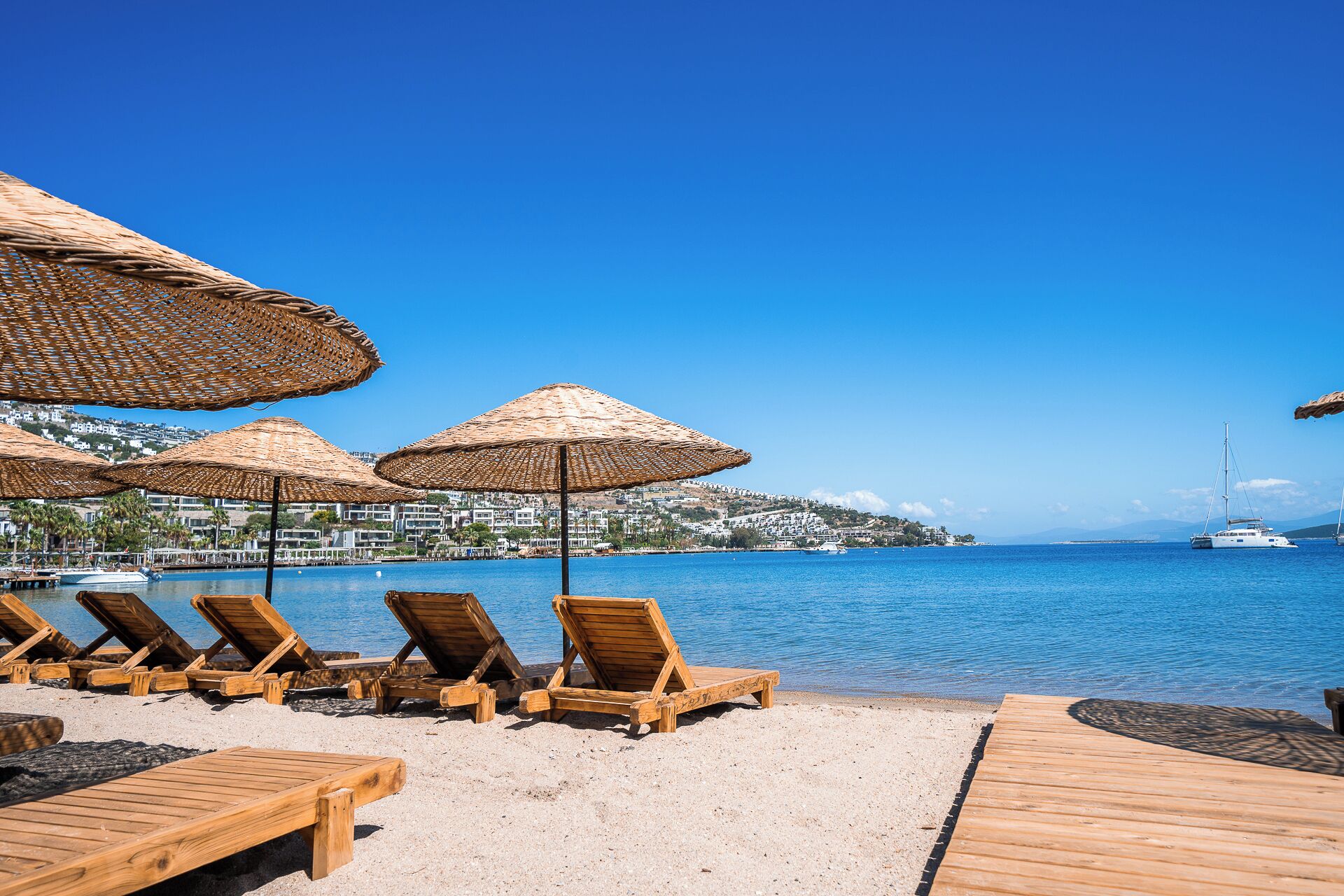 Private beach, free beach cabanas, beach shuttle, sun-loungers