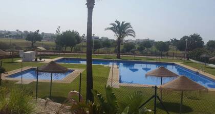 Beach & golf penthouse apartment with AC and WiFi