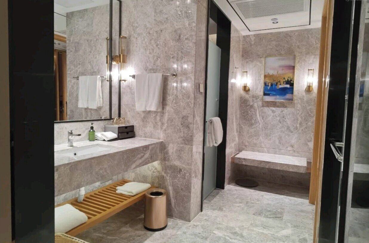 Deluxe Room, No Windows | Bathroom | Free toiletries, hair dryer, slippers, towels