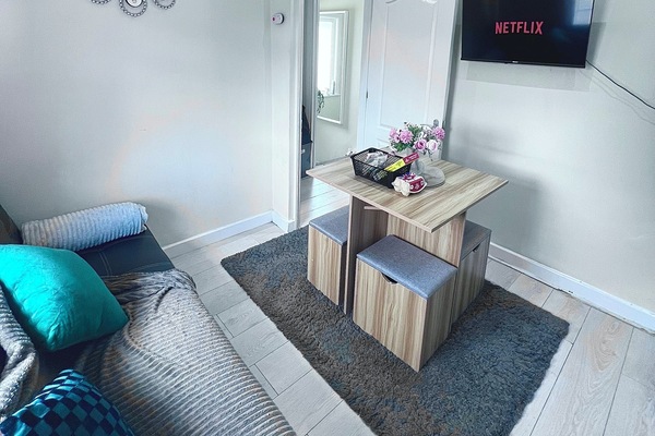 Open plan seating area and kitchenette