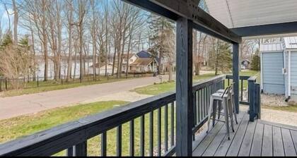 Short Description: Lakewood Bungalow | Screened Porch • 2 Baths • Basement Hangout • Walk to Lake• Onsite Laundry