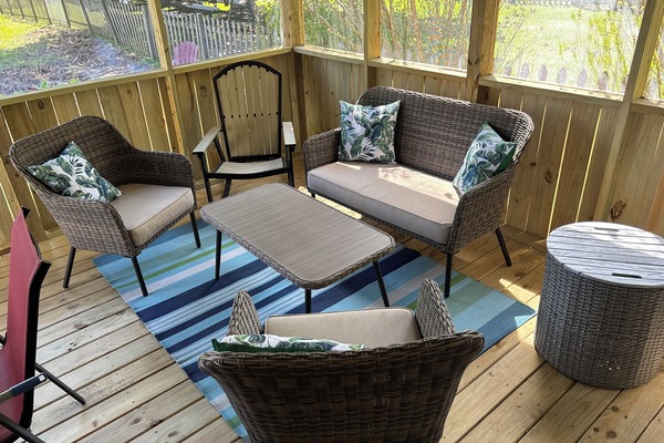New patio furniture in the screened in porch- just added!