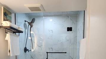 Hair dryer, towels, soap, shampoo