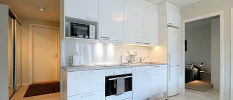 Standard Apartment, Balcony | Private kitchen | Electric kettle, toaster