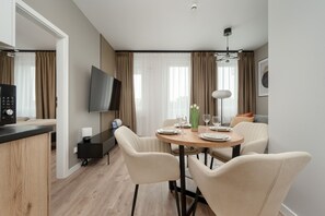 In-room dining - Grey and Beige Apartment by Renters (Wroclaw)