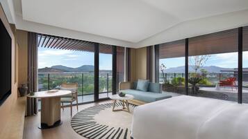 Family Suite, Balcony, Garden View | Minibar, in-room safe, blackout curtains, iron/ironing board