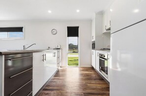 Fridge, microwave, cookware/dishes/utensils