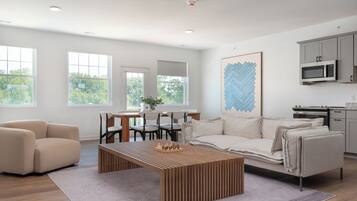 Family Apartment, 2 Bedrooms (Self Check-in with Virtual Front Desk) | Living area | 50-inch flat-screen TV with digital channels