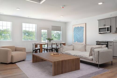 Family Apartment, 2 Bedrooms (Self Check-in with Virtual Front Desk) | Living area | 50-inch flat-screen TV with digital channels