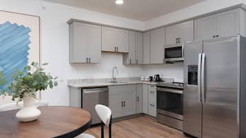 Family Apartment, 3 Bedrooms (Self Check-in with Virtual Front Desk) | Private kitchen | Electric kettle, cleaning supplies