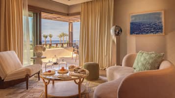 Deluxe Suite, Sea View | Living area | 65-inch flat-screen TV with satellite channels, tablet, pay movies