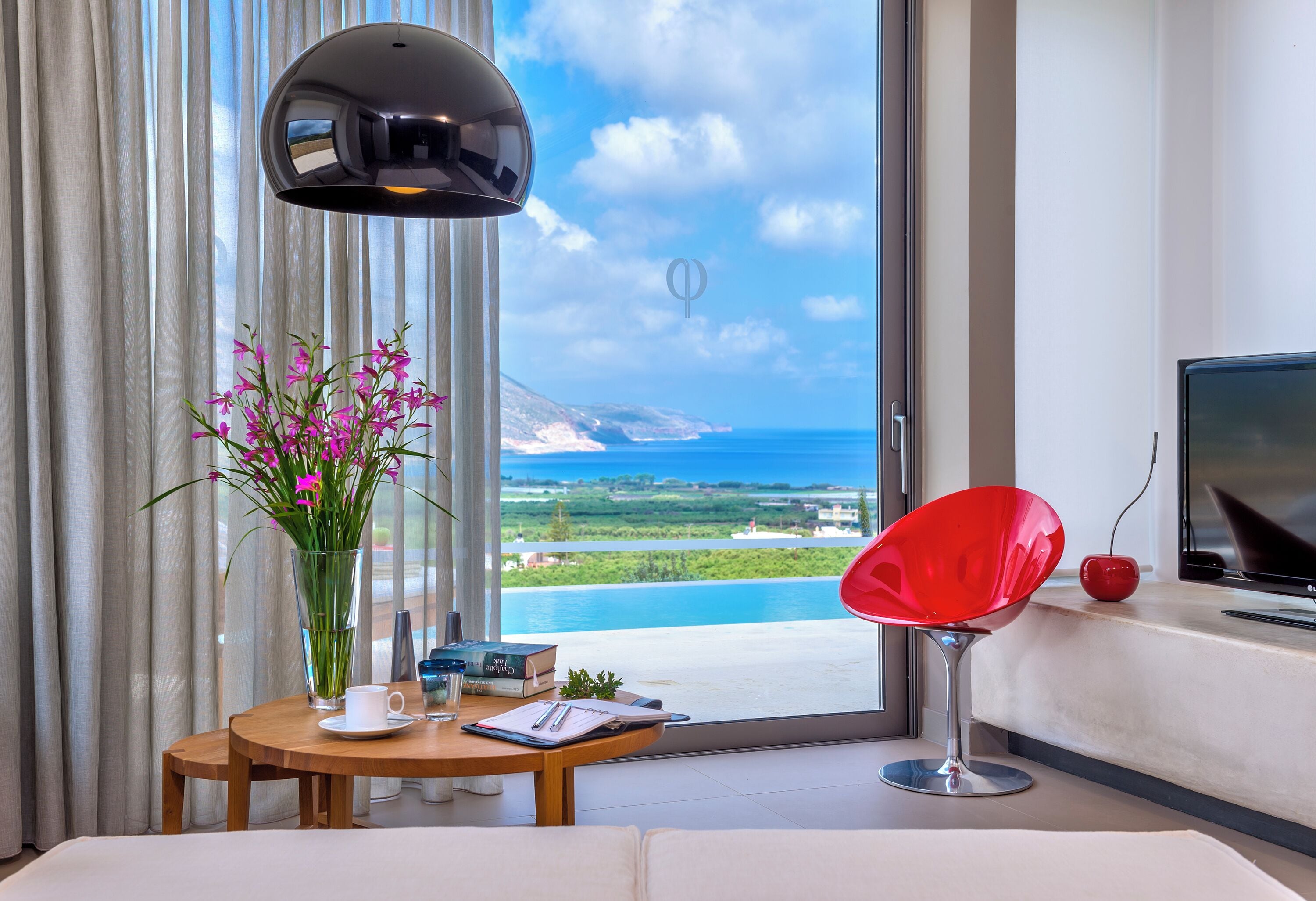 Villa Charisma | Living area | 42-inch Smart TV with digital channels, Netflix, streaming services