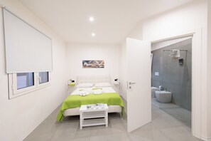 1 bedroom, desk, iron/ironing board, travel cot