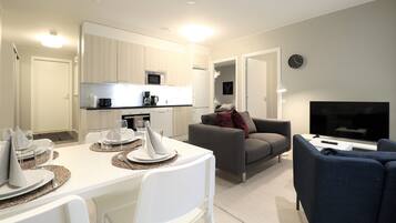 Standard Apartment | Living area | Flat-screen TV