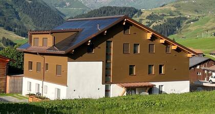 Neue Ferienwohnung in mitten der SkiArena Andermatt Sedrun mit Indoorgolfplatz