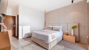 Premium bedding, down duvets, minibar, in-room safe