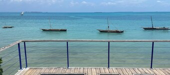 Charming Zanzibar suites with ocean views and modern amenities. 