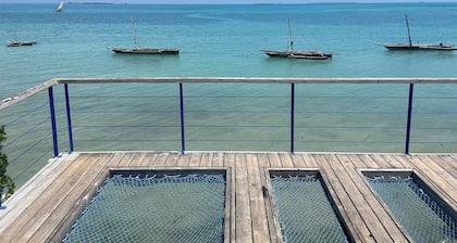 Charming Zanzibar suites with ocean views and modern amenities.