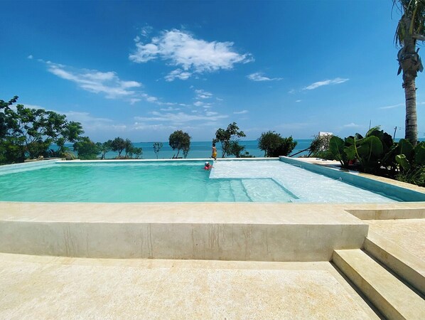 Pool - Charming Zanzibar suites with ocean views and modern amenities.  (Mchamba Wima)