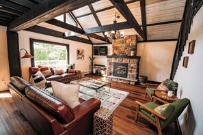 Smart TV, fireplace, table football, books