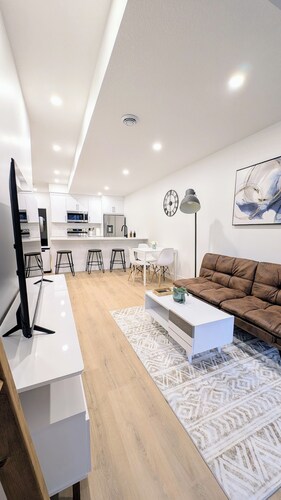 Modern 2BR Suite | Private Patio | 5 Min Downtown/Zoo/Stampede | Central & Safe