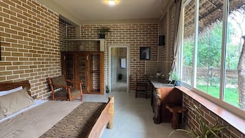 Deluxe Double Room, Garden View | Individually decorated, individually furnished, desk, laptop workspace