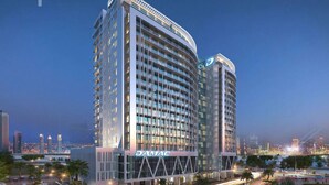 A high-rise hotel with a modern design, featuring a prominent 'DAMAC' sign on the facade. - GLOBALSTAY. DAMAC Majestine Apartments (Dubai)