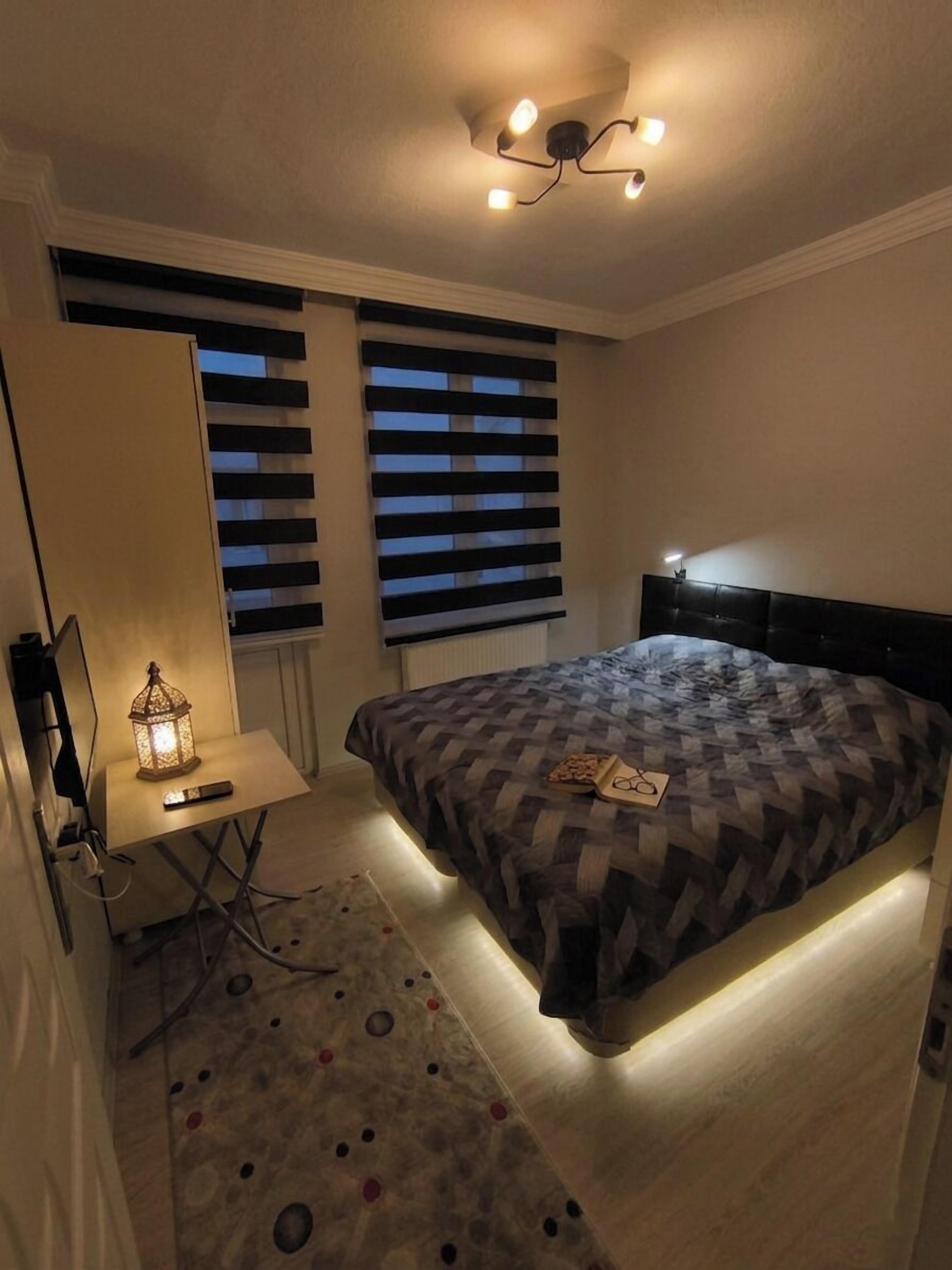 Apartemen Deluks, 1 kamar tidur, Boleh Merokok, balkon | 1 kamar tidur dan didekorasi berbeda-beda
