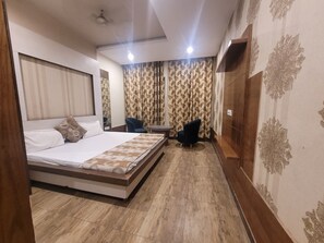 Executive Double Room | Laptop workspace, soundproofing, rollaway beds, free WiFi - The Aura Grand (Rohtak)