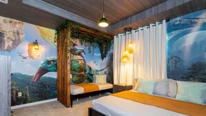 A bedroom with a mural of a dragon, a bed, a nightstand, and a hanging light fixture. - Modern 6BR Home with Water Club House (Kissimmee)