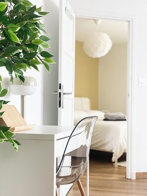 1 bedroom, desk, iron/ironing board, travel crib