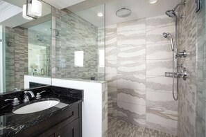 Shower, jetted tub, hair dryer, towels