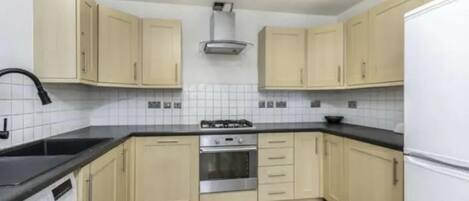 Apartment | Private kitchen | Fridge, microwave, oven, stovetop