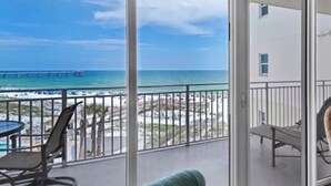 A balcony with a view of the ocean and a pier. - Closest 2 Bedroom to Beach Spectacular Gulf, Pier, & 🐬 View at A403 Waterscape (Fort Walton Beach)