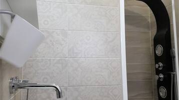 Panoramic Apartment, 1 Bedroom, Terrace | Bathroom | Shower, hydromassage showerhead, hair dryer, bidet