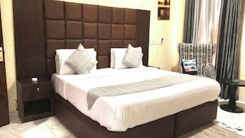 Deluxe Room, Balcony, City View | Desk, laptop workspace, free WiFi