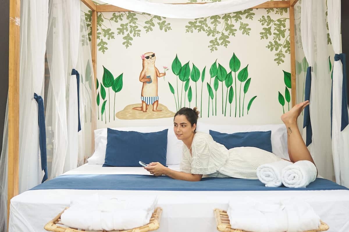 Deluxe kamer, 1 twee- of 2 eenpersoonsbedden, 1 queensize bed, uitzicht op lagune | Luxe beddengoed, donzen dekbedden, Select Comfort-bedden, een minibar