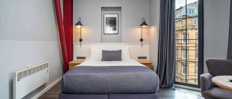 Egyptian cotton sheets, premium bedding, Tempur-Pedic beds, free minibar